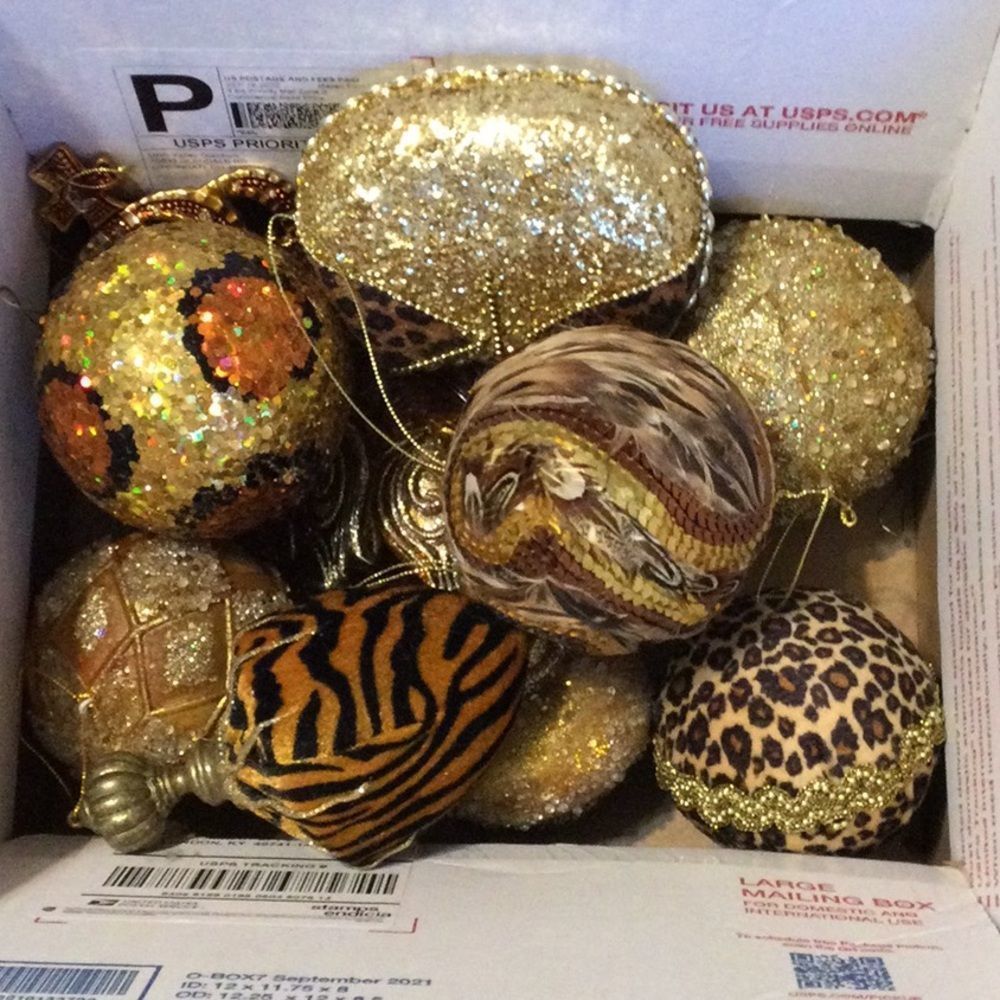 13 Horchow classy leopard and gold decorations. With 6 ropes of garland  36 ft.
